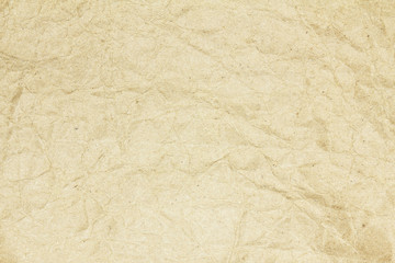Recycled crumpled brown paper texture or paper background for design with copy space for text or image.