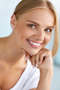 Beauty Portrait Of Woman With Beautiful Smile Fresh Face Smiling. High Resolution Image
