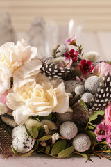 Floral arrangement with carnation and ranunculus flowers