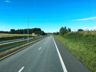 Fototapeta na wymiar Norwegian highway in Vestfold county in Eastern Norway. Part of the European route E18.