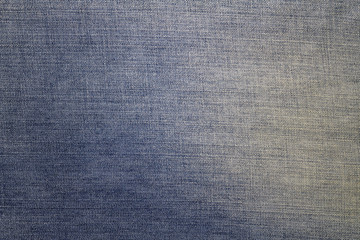 Texture of blue jeans textile background