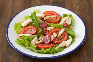 fresh salad with chicken and chourico