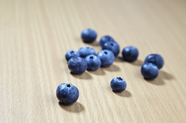 blueberries on wooden table