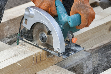 Work with circular saws closeup