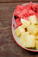 slices of watermelon and pineapple