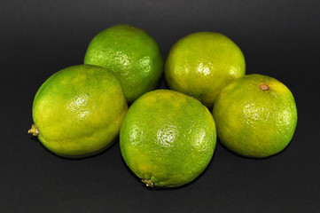 Lemons on black background