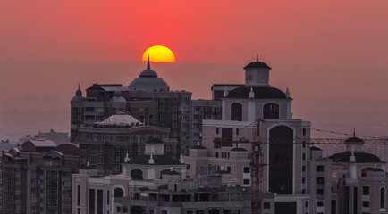 the setting sun over the city