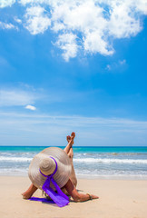 Fototapeta na wymiar Woman in bikini at tropical beach