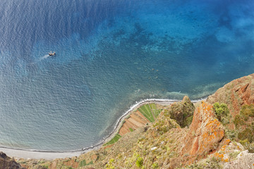 View from Cabo Girao cliff with sailing vessel, Madeira island, Portugal