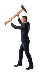 Obraz premium Businessman raising a big mallet