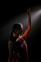 indian woman dancing with the light