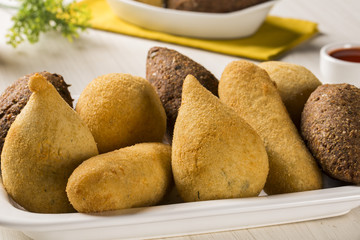 Mixed brazilian snack on the table.