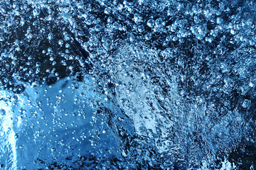Fototapeta na wymiar Ice texture with frozen bubbles