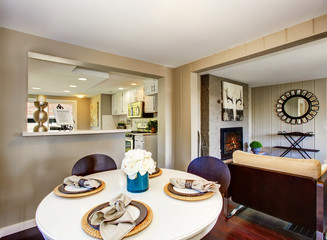 Dining area with big window and serving table set