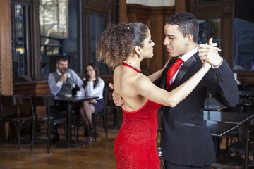Passionate Tango Dancers Performing While Mid Adult Couple Datin