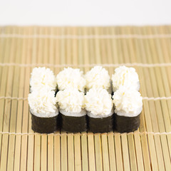 Isolated sushi / rolls.