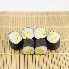 Isolated sushi / rolls.