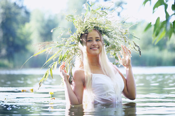 girl with wreath in a river