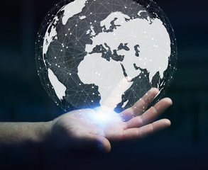 Businessman using digital tactile world interface with his finge