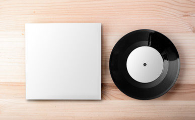 Blank vinyl cover template on white wall background