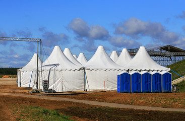 White tents at the exhibition camp