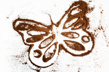 Forma di Farfalla con caffè macinato