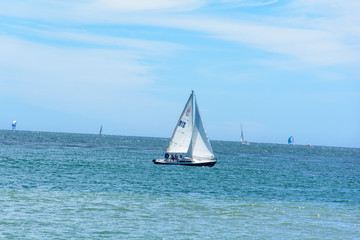 Obraz premium Sailing Boat in Blue Ocean