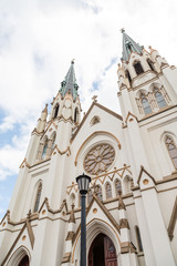 Obraz premium Lamp Post by Church