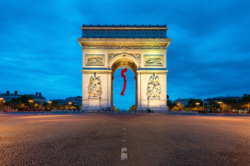 Fototapeta na wymiar Arc de Triomphe Paris and Champs Elysees with a large France