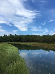 Fototapeta na wymiar river and sky in rural southern Maine