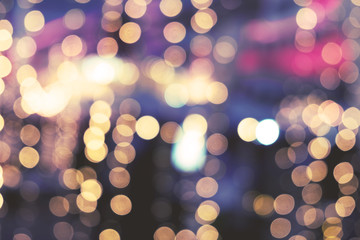 Christmas abstract blur background - light bokeh from Xmas tree at night party in winter. vintage...