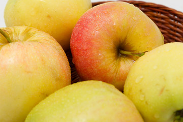 ripe yellow apples on a white background