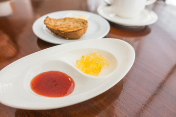 Breakfast with toast and coffee.