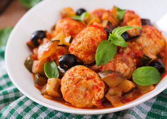 Juicy meatballs of turkey meat with vegetables (zucchini, eggplant, olive, tomato)