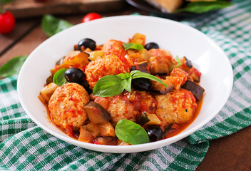 Juicy meatballs of turkey meat with vegetables (zucchini, eggplant, olive, tomato)