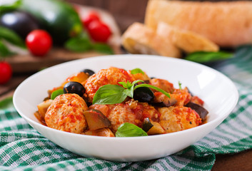 Juicy meatballs of turkey meat with vegetables (zucchini, eggplant, olive, tomato)