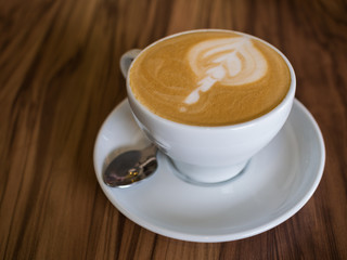 Coffee cup on a wooden table