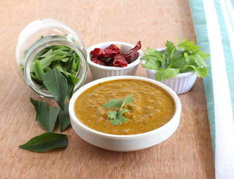Indian food curry leaves chutney, which is a healthy, vegetarian, traditional and popular side dish for items like chapati, dosa and rice.