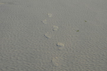 stopy na plaży