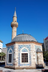 Famous Yali Mosque or Konak Mosque in Izmir, Turkey. Konak Mosque was built in 1755. It has the shape of a hexagon and one minaret