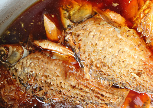 Java barb or Silver barb fish in deep sauce boiling