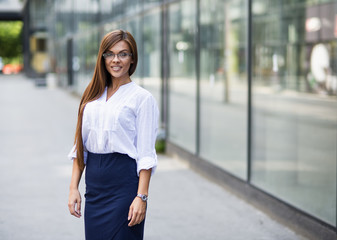 Portrait of a young smiling business woman.