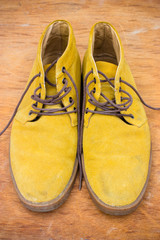 Orange shoes on the wooden floor