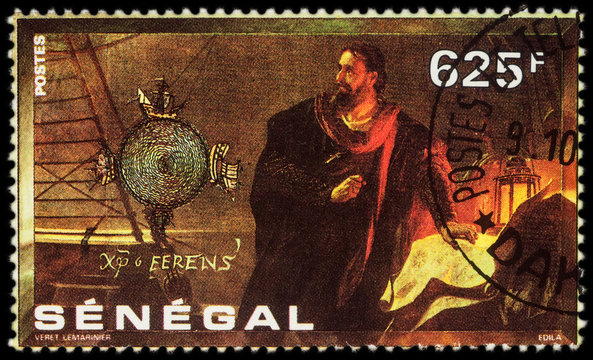 Christopher Columbus with a map on postage stamp