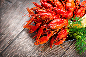 Crayfish. Red boiled crawfish on a wooden table in rustic style