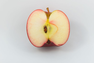 Half Fresh Red apple fruit on White background