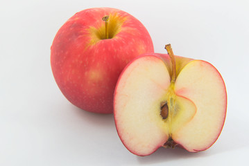 Half Fresh Red apple fruit on White background