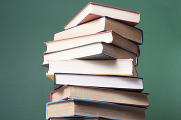 Stack of colorful books. Education background. Back to school. Copy space for text.