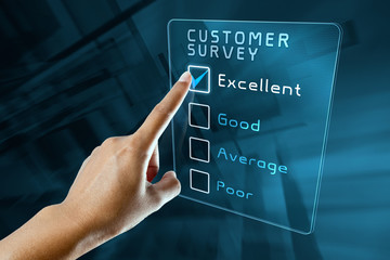 hand clicking online customer survey on virtual screen interface