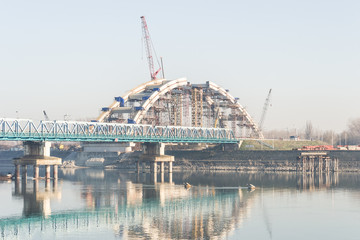 NOVI SAD, SERBIA - DECEMBAR 22, 2014: Construction of the bridge on the Danube River